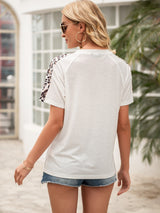 Ivy Lane Pocketed Leopard Round Neck Short Sleeve T-Shirt